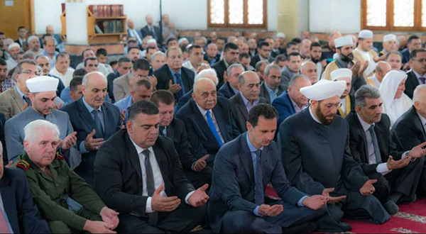 Syrian President Bashar al-Assad during Eid al-Fitr prayers 